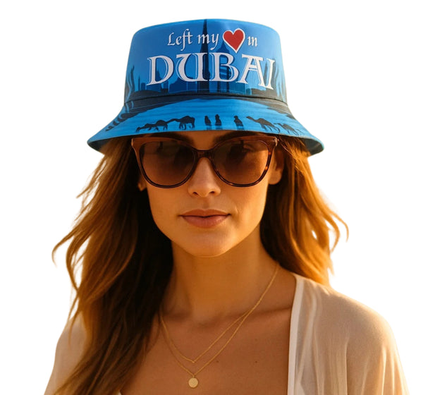 Habibi Come to Dubai Bucket Hat worn by a woman, featuring bold text and vibrant design celebrating Dubai.